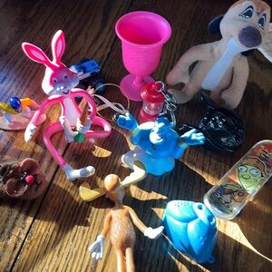 Bundle of little toys Disney Pumba Bullwinkle Aladdin fingerboard monster truck